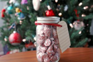 gift card in jar with candy in front of Christmas tree