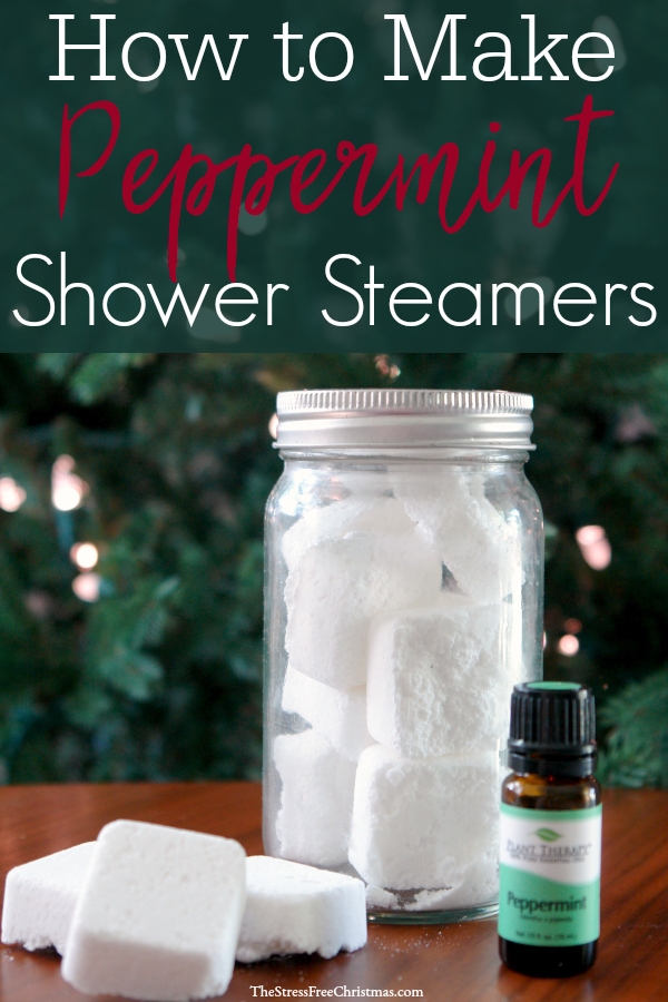 jar of shower steamers and essential oils in front of Christmas tree