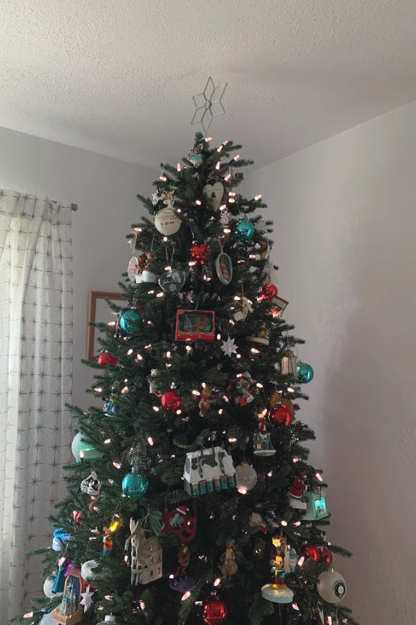 Christmas tree filled with Hallmark ornaments
