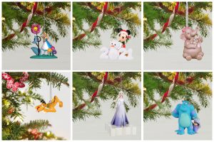 collage of six hallmark disney ornaments in Christmas tree