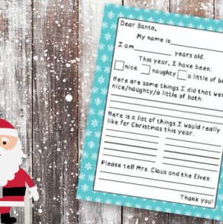 letter to Santa on grey wooden background with snow and Santa graphic