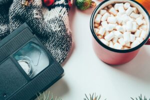 vhs tape on table with hot chocolate