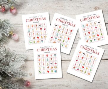 halfway to christmas bingo cards on christmas table