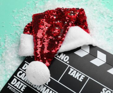 movie clapper with Santa hat